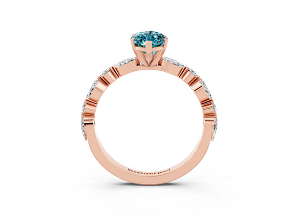 Rose gold Marquise Cut Blue Topaz Ring with Marquise and Round  Side Stones and Four-Prong Setting