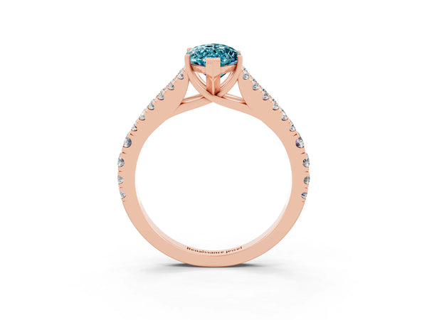 Rose gold Marquise Cut Blue Topaz Split Shank Pavé Engagement Ring with Four-Prong Setting