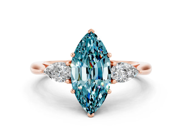 Rose gold Marquise Cut Blue Topaz Three-Stone Ring with Pear  Side Stones and Prong Setting