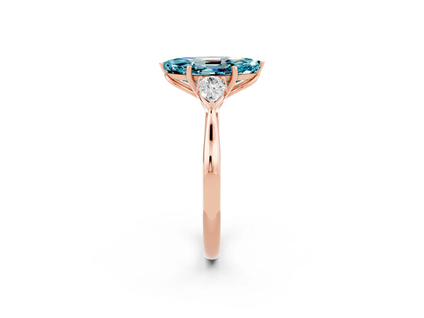 Rose gold Marquise Cut Blue Topaz Three-Stone Ring with Pear  Side Stones and Prong Setting