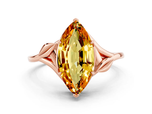 Rose gold Marquise Cut Citrine Solitaire Ring with Twist Band and Four-Prong Setting