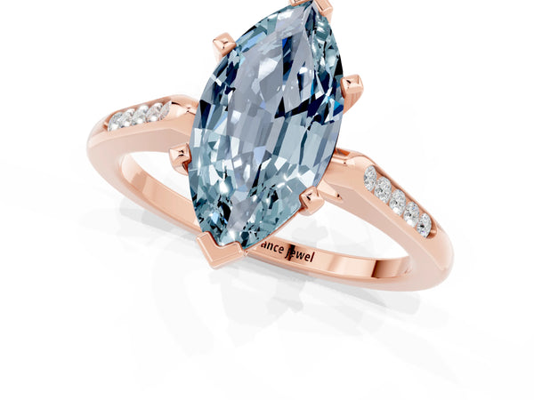 Rose gold Marquise Cut Aquamarine Solitaire Ring with Channel Set Round Band and Prong Setting