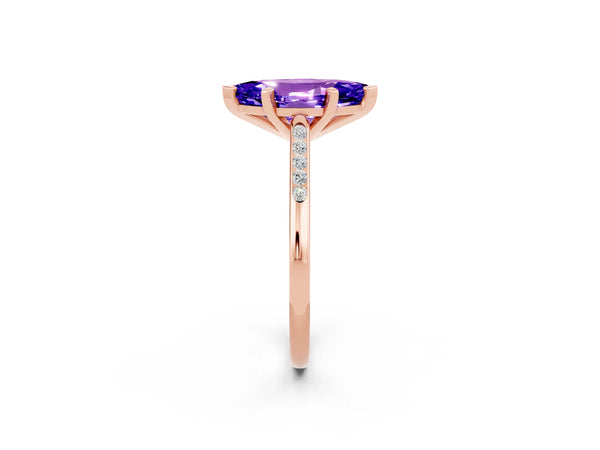 Rose gold Marquise Cut Tanzanite Solitaire Ring with Channel Set Round Band and Prong Setting