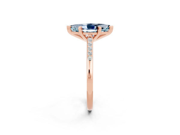 Rose gold Marquise Cut Aquamarine Solitaire Ring with Channel Set Round Band and Prong Setting