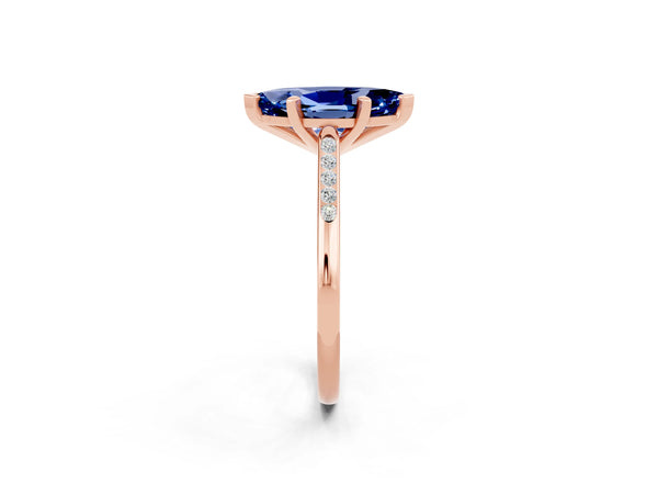 Rose gold Marquise Cut Blue Sapphire Solitaire Ring with Channel Set Round Band and Prong Setting