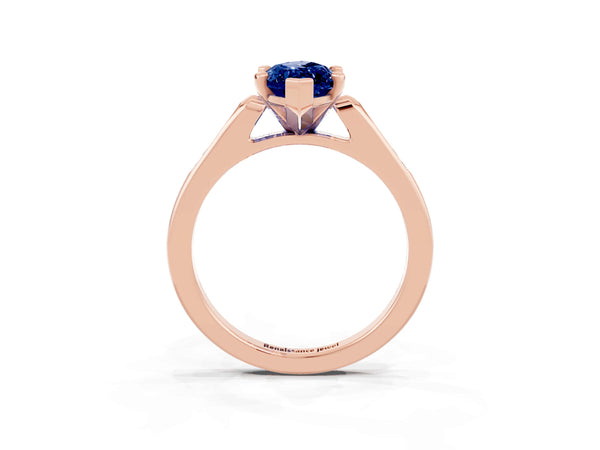 Rose gold Marquise Cut Blue Sapphire Solitaire Ring with Channel Set Round Band and Prong Setting