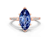 Rose gold Marquise Cut Cut Channel Set Solitaire Engagement Ring with Four-Prong Setting