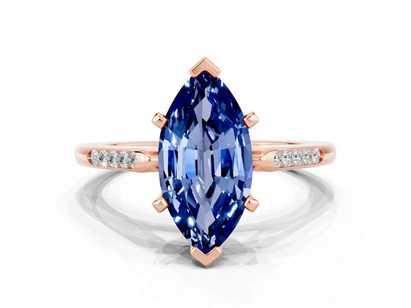 Rose gold Marquise Cut Blue Sapphire Solitaire Ring with Channel Set Round Band and Prong Setting