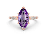 Rose gold Marquise Cut Cut Channel Set Solitaire Engagement Ring with Four-Prong Setting