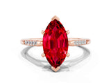 Rose gold Marquise Cut Cut Channel Set Solitaire Engagement Ring with Four-Prong Setting