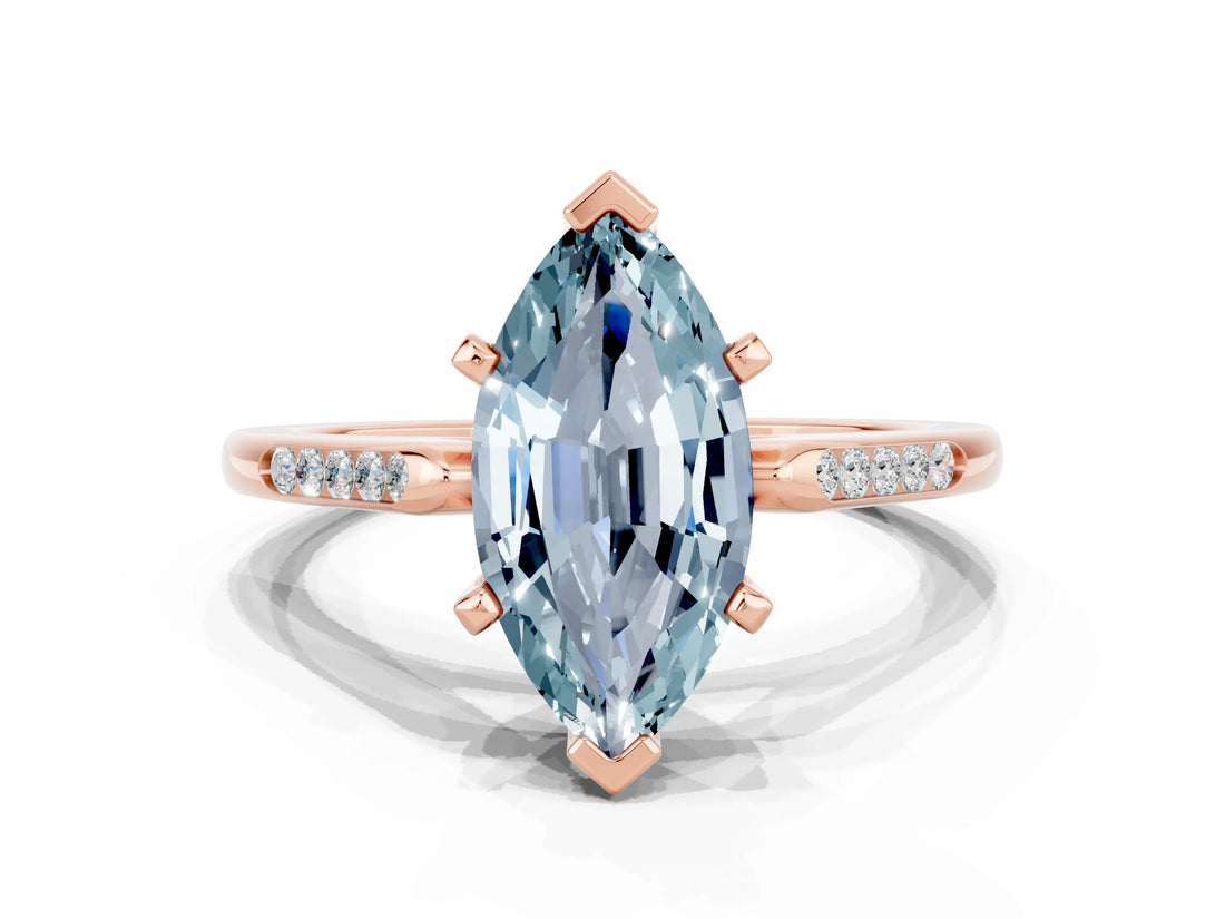 Rose gold Marquise Cut Cut Channel Set Solitaire Engagement Ring with Four-Prong Setting