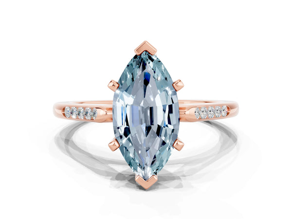 Rose gold Marquise Cut Aquamarine Solitaire Ring with Channel Set Round Band and Prong Setting