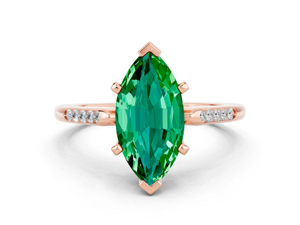 Rose gold Marquise Cut Emerald Solitaire Ring with Channel Set Round Band and Prong Setting