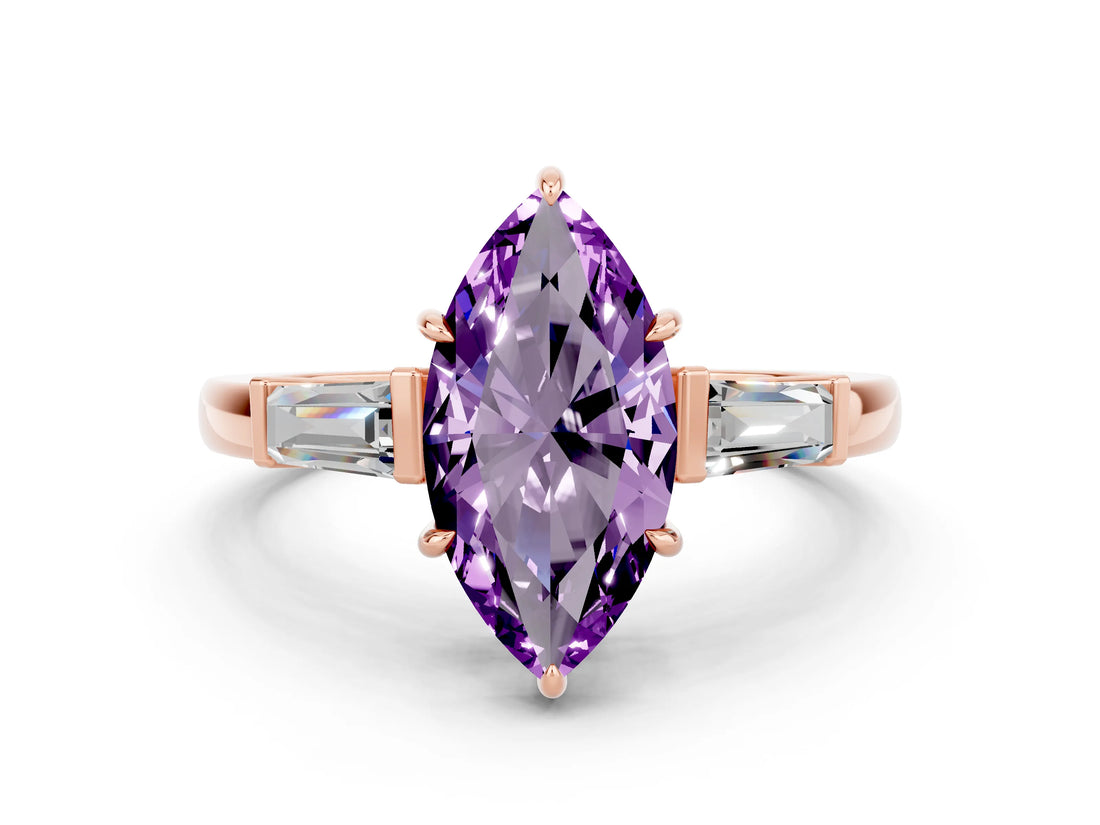 Rose gold Marquise Cut Cut Diamond Ring with Tapered Baguette Side Stones in Four-Prong Setting