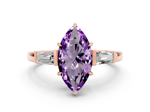 Rose gold Marquise Cut Cut Diamond Ring with Tapered Baguette Side Stones in Four-Prong Setting