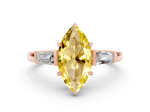 Rose gold Marquise Cut Cut Diamond Ring with Tapered Baguette Side Stones in Four-Prong Setting
