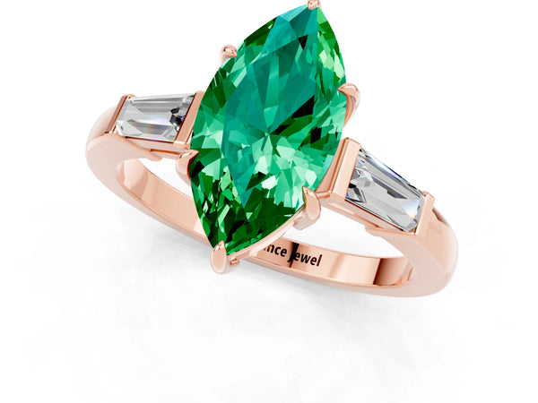 Rose gold Marquise Cut Emerald Three-Stone Ring with Tapered Baguette Side Stones and Prong Setting