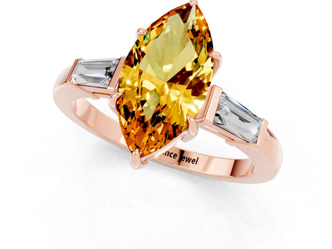 Rose gold Marquise Cut Cut Diamond Ring with Tapered Baguette Side Stones in Four-Prong Setting_1