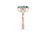 Rose gold Marquise Cut Cut Diamond Ring with Tapered Baguette Side Stones in Four-Prong Setting_2