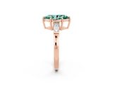Rose gold Marquise Cut Cut Diamond Ring with Tapered Baguette Side Stones in Four-Prong Setting_2