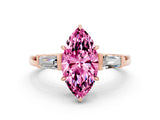 Rose gold Marquise Cut Cut Diamond Ring with Tapered Baguette Side Stones in Four-Prong Setting