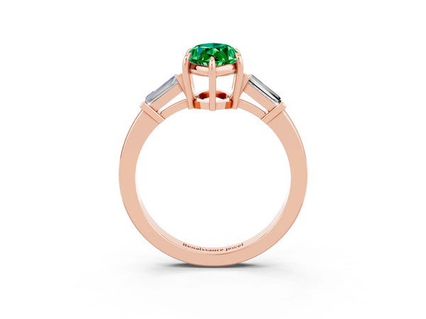 Rose gold Marquise Cut Emerald Three-Stone Ring with Tapered Baguette Side Stones and Prong Setting