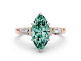 Rose gold Marquise Cut Cut Diamond Ring with Tapered Baguette Side Stones in Four-Prong Setting