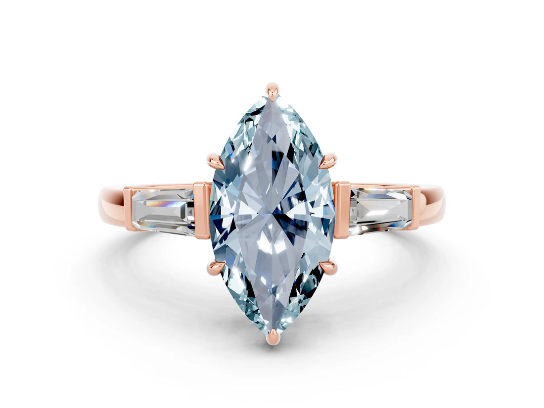 Rose gold Marquise Cut Cut Diamond Ring with Tapered Baguette Side Stones in Four-Prong Setting