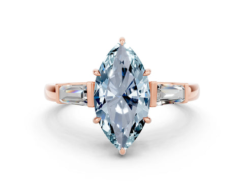 Rose gold Marquise Cut Cut Diamond Ring with Tapered Baguette Side Stones in Four-Prong Setting