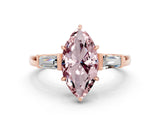 Rose gold Marquise Cut Cut Diamond Ring with Tapered Baguette Side Stones in Four-Prong Setting