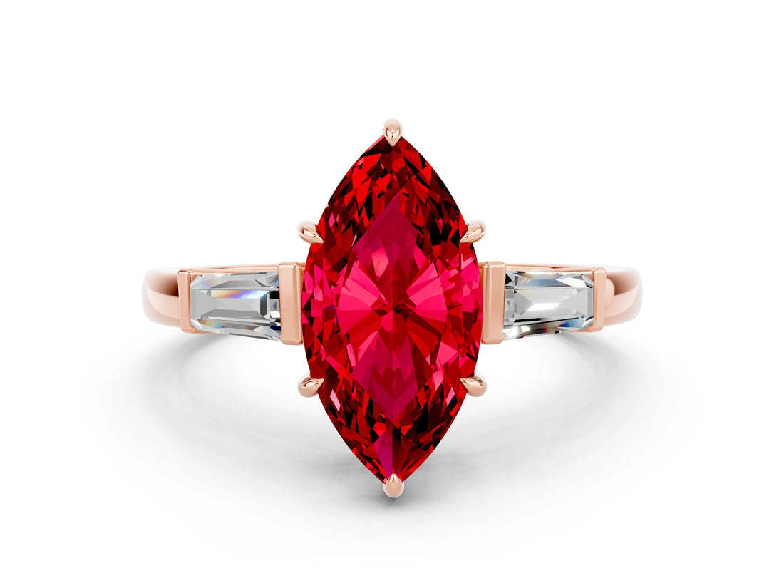 Rose gold Marquise Cut Cut Diamond Ring with Tapered Baguette Side Stones in Four-Prong Setting