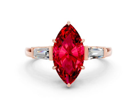 Rose gold Marquise Cut Cut Diamond Ring with Tapered Baguette Side Stones in Four-Prong Setting