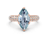 Rose gold Marquise Cut Cut Pave Diamond Engagement Ring with Channel Set Band and Four-Prong Setting