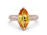Rose gold Marquise Cut Cut Pave Diamond Engagement Ring with Channel Set Band and Four-Prong Setting