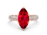 Rose gold Marquise Cut Cut Pave Diamond Engagement Ring with Channel Set Band and Four-Prong Setting