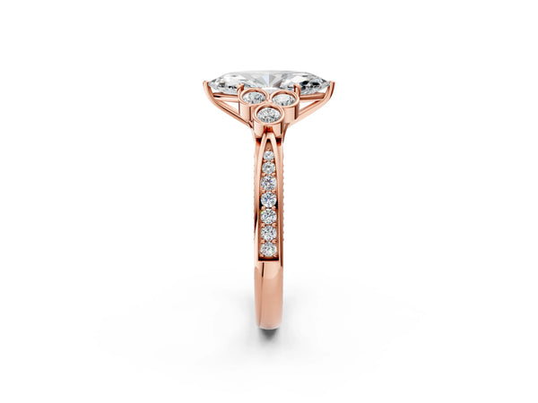 Rose gold Marquise Cut Diamond Engagement Ring with Bezel Set Round Side Stones and Prong Setting