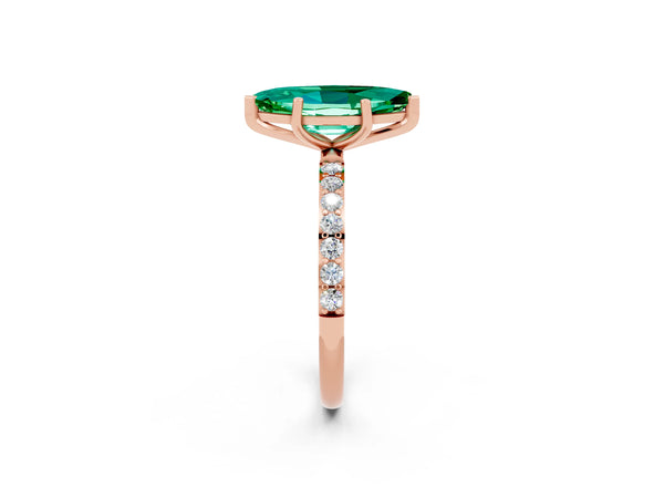 Rose gold Marquise Cut Emerald Solitaire Ring with Round Pavé Shoulders and Prong Setting