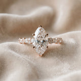 Rose gold Marquise Cut Diamond Side Stone Solitaire Ring with Round  and Four-Prong Setting_559