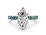 Rose gold Marquise Cut Diamond Side Stone Solitaire Ring with Round with Blue Topaz side stone and Four-Prong Setting