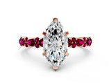 Rose gold Marquise Cut Diamond Side Stone Solitaire Ring with Round with Garnet side stone and Four-Prong Setting