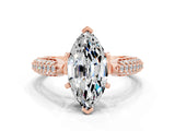 Rose gold Marquise Cut Diamond Solitaire Engagement Ring with Pavé Band and Four-Prong Setting