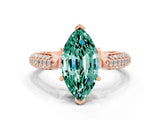 Rose gold Marquise Cut Diamond Solitaire Engagement Ring with Pavé Band and Four-Prong Setting
