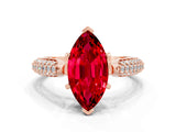 Rose gold Marquise Cut Diamond Solitaire Engagement Ring with Pavé Band and Four-Prong Setting