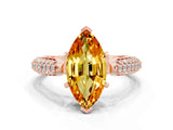 Rose gold Marquise Cut Diamond Solitaire Engagement Ring with Pavé Band and Four-Prong Setting