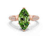 Rose gold Marquise Cut Diamond Solitaire Engagement Ring with Pavé Band and Four-Prong Setting