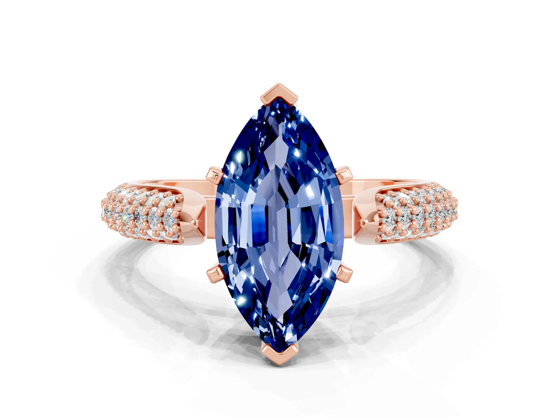 Rose gold Marquise Cut Diamond Solitaire Engagement Ring with Pavé Band and Four-Prong Setting