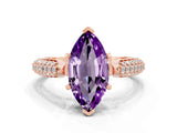 Rose gold Marquise Cut Diamond Solitaire Engagement Ring with Pavé Band and Four-Prong Setting