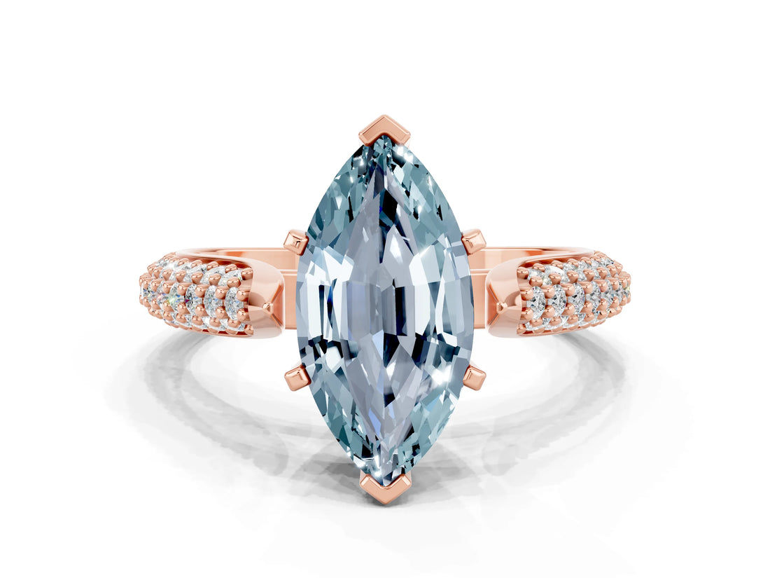 Rose gold Marquise Cut Diamond Solitaire Engagement Ring with Pavé Band and Four-Prong Setting
