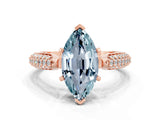Rose gold Marquise Cut Diamond Solitaire Engagement Ring with Pavé Band and Four-Prong Setting