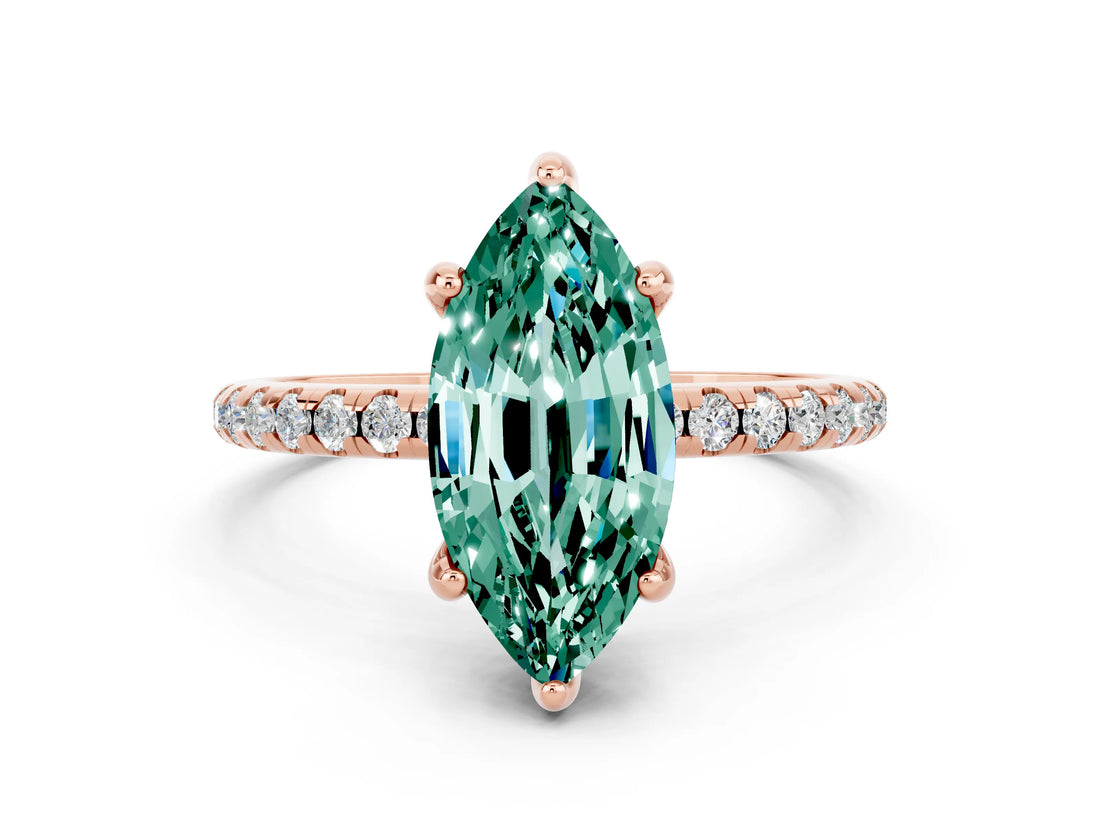 Rose gold Marquise Cut Diamond Solitaire Ring with Four-Prong Setting and Pavé Band